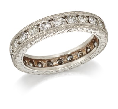 Lot 1755 - A DIAMOND ETERNITY RING