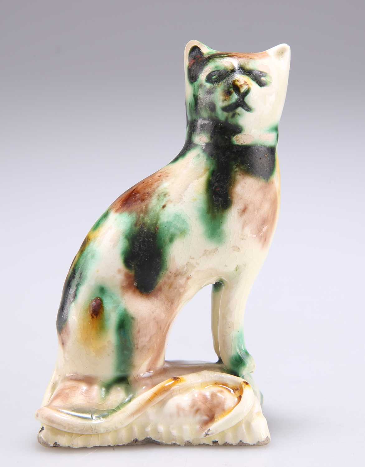 Lot 87 - A WHIELDON-TYPE POTTERY MODEL OF A SEATED CAT