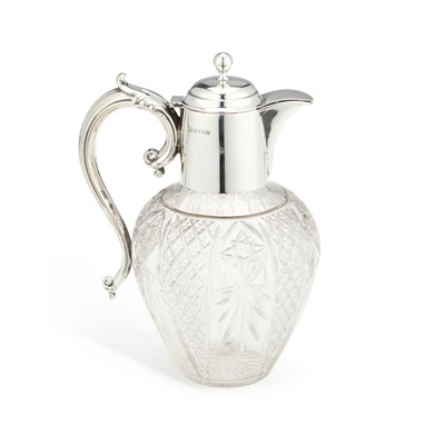 Lot 188 - A LATE VICTORIAN SILVER-MOUNTED CUT-GLASS CLARET JUG