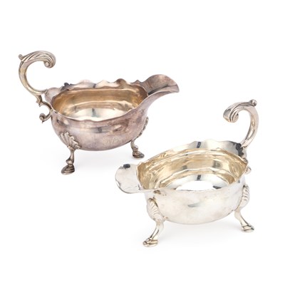 Lot 236 - A NEAR PAIR OF GEORGE II SILVER SAUCEBOATS