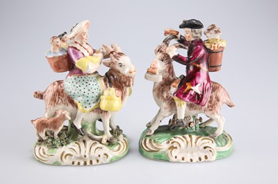 Lot 115 - A PAIR OF STAFFORDSHIRE FIGURES OF THE WELSH TAILOR AND HIS WIFE, EARLY 19TH CENTURY