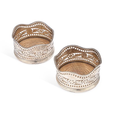 Lot 158 - A PAIR OF GEORGE III STYLE SILVER COASTERS