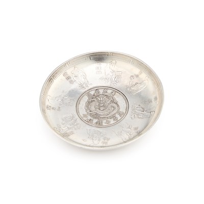 Lot 84 - A CHINESE 'DRAGON DOLLAR' SILVER DISH