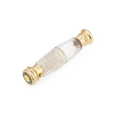 Lot 192 - A VICTORIAN SILVER-GILT-TOPPED CUT-GLASS DOUBLE-ENDED SCENT BOTTLE