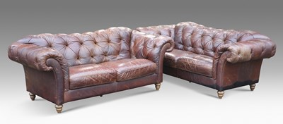 Lot 449 - A PAIR OF DEEP-BUTTONED BROWN LEATHER CHESTERFIELD SETTEES