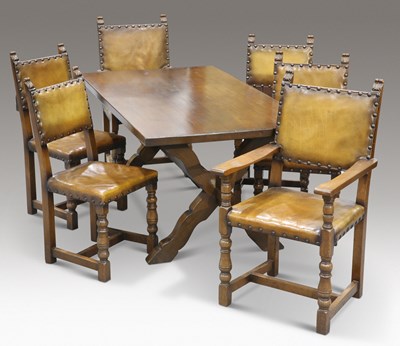 Lot 427 - A PERIOD STYLE OAK REFECTORY DINING TABLE AND SIX CHAIRS