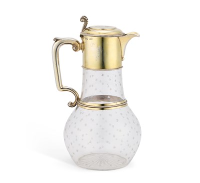 Lot 185 - A VICTORIAN SILVER-GILT MOUNTED ETCHED GLASS CLARET JUG