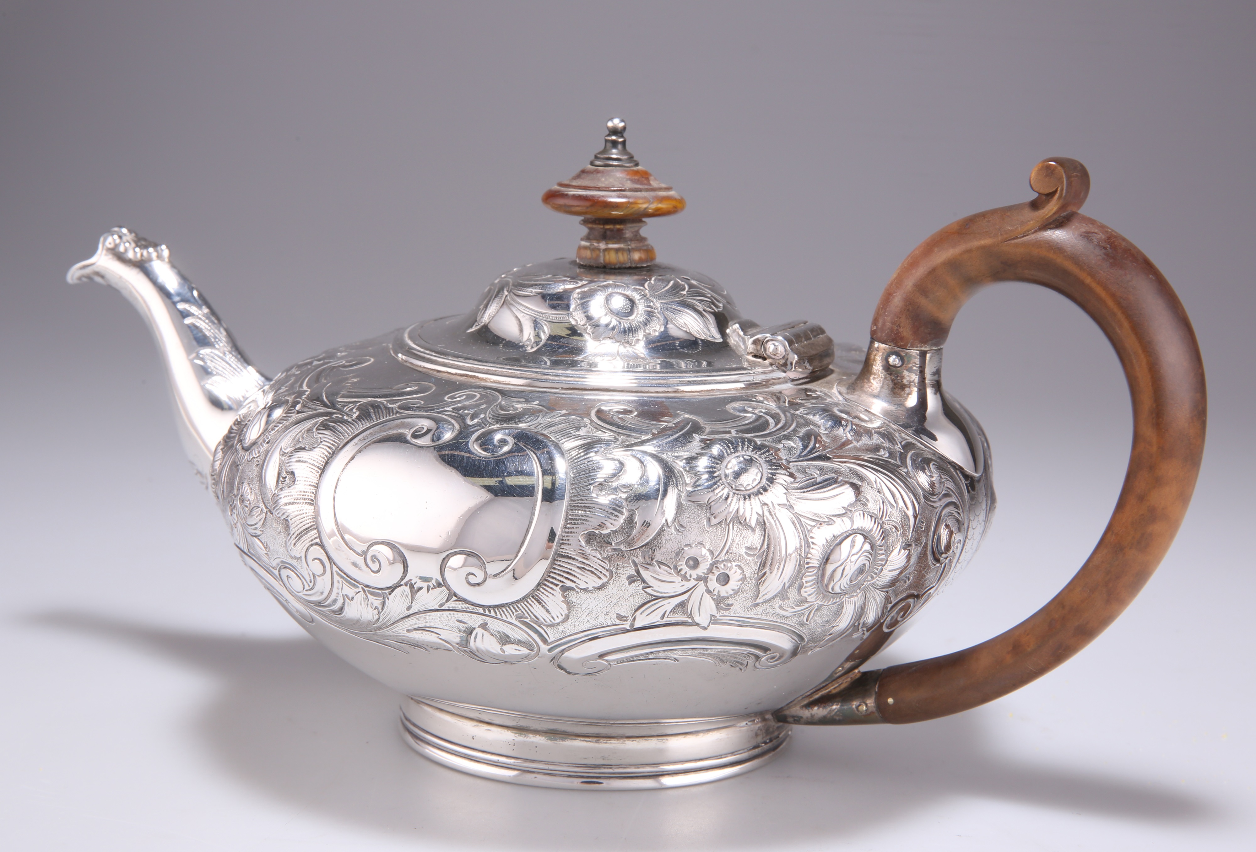 Lot 1168 AN EARLY VICTORIAN SILVER TEAPOT