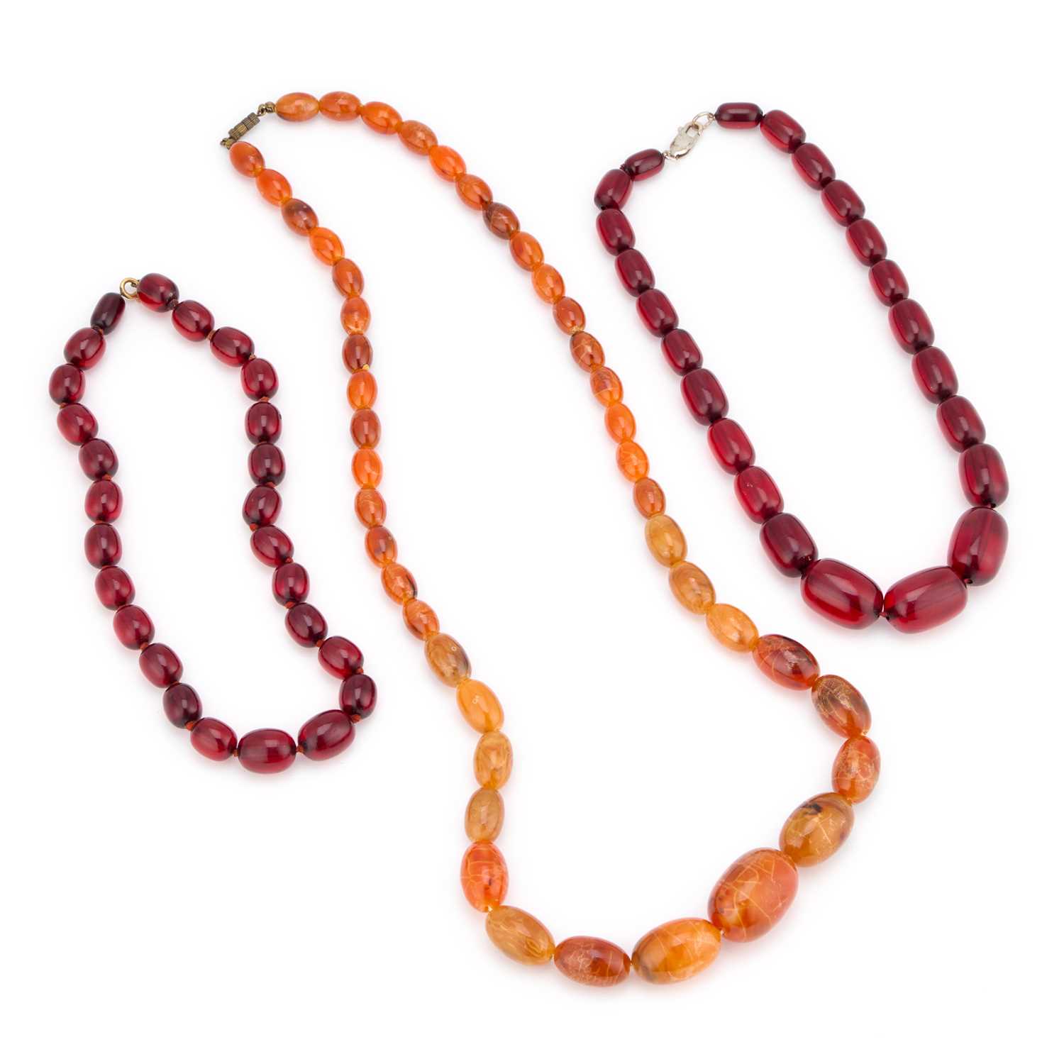 Prystal Lot 694 - TWO PRYSTAL CHERRY AMBER BAKELITE NECKLACES