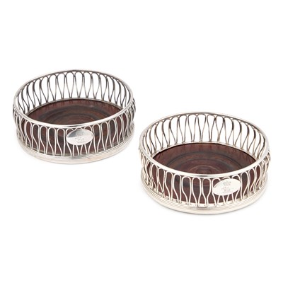 Lot A PAIR OF GEORGE III SILVER COASTERS