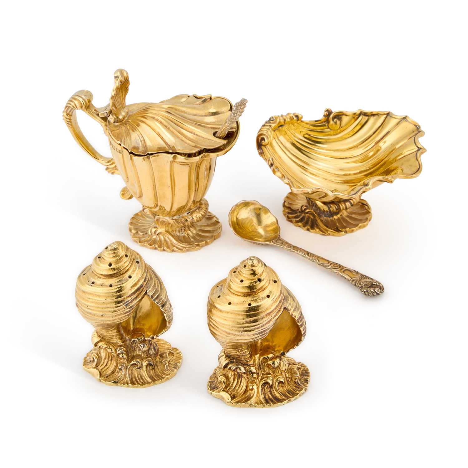 Lot A FINE ELIZABETH II SILVER-GILT CONDIMENT SET