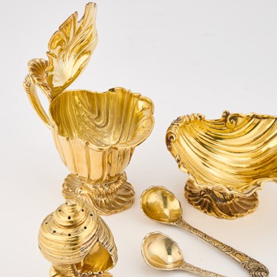Lot 389 - A FINE ELIZABETH II SILVER-GILT CONDIMENT SET