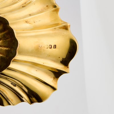 Lot 389 - A FINE ELIZABETH II SILVER-GILT CONDIMENT SET