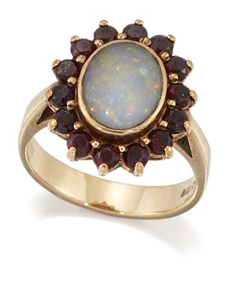 Lot 1664 - A 9 CARAT GOLD OPAL AND GARNET CLUSTER RING