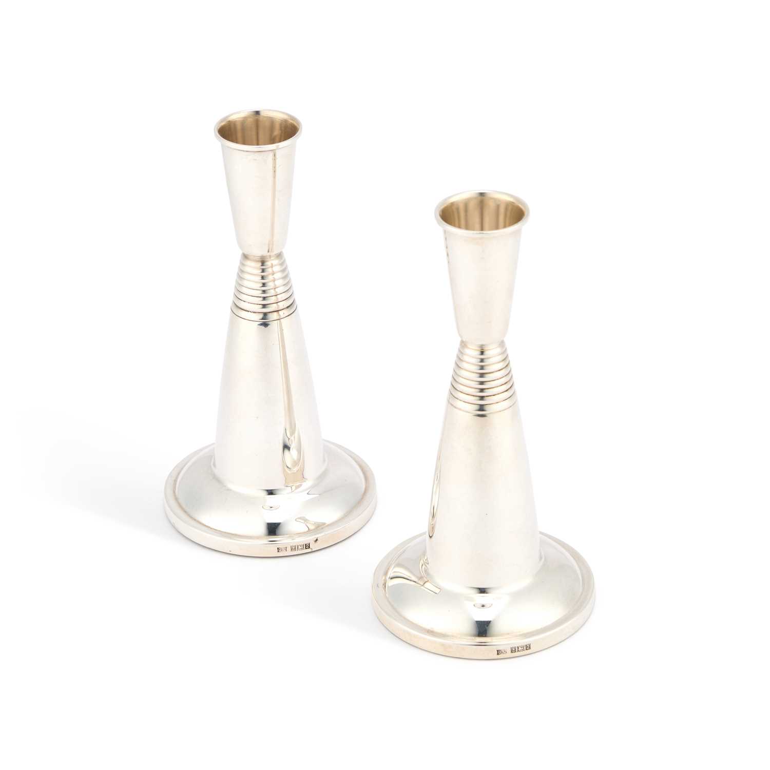 Lot A PAIR OF MODERNIST SILVER CANDLESTICKS