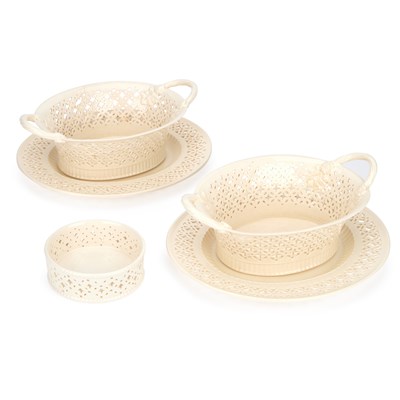 Lot A PAIR OF LEEDS POTTERY CREAMWARE BASKETS ON STANDS