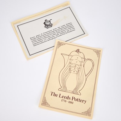 Lot A PAIR OF LEEDS POTTERY CREAMWARE BASKETS ON STANDS