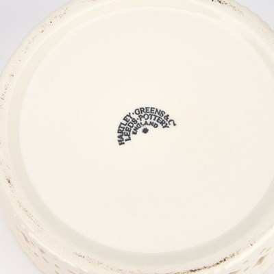 Lot A PAIR OF LEEDS POTTERY CREAMWARE BASKETS ON STANDS