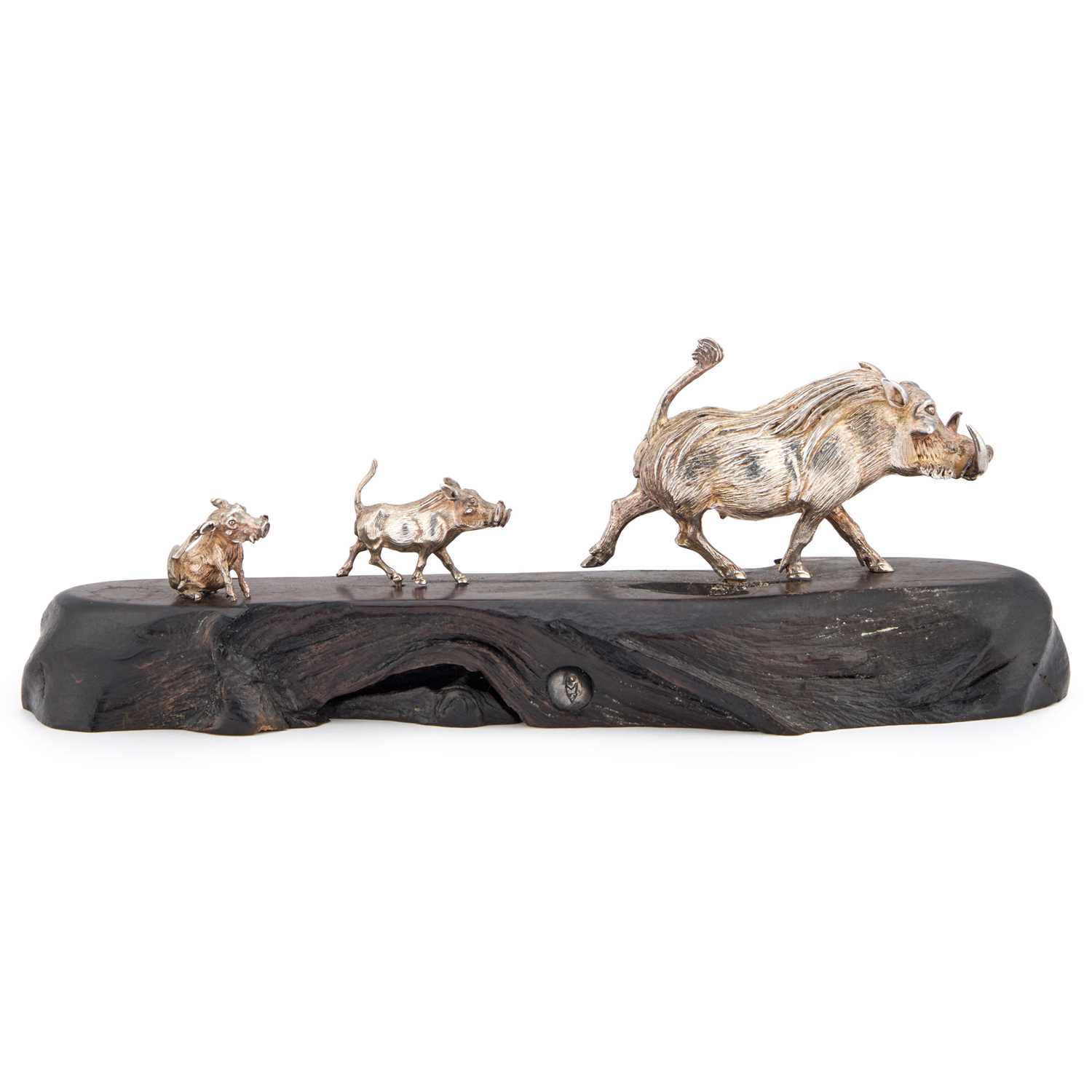 Lot PATRICK MAVROS: A SILVER SCULPTURE OF A WARTHOG FAMILY RUNNING