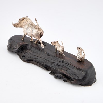 Lot 383 - PATRICK MAVROS: A SILVER SCULPTURE OF A WARTHOG FAMILY RUNNING