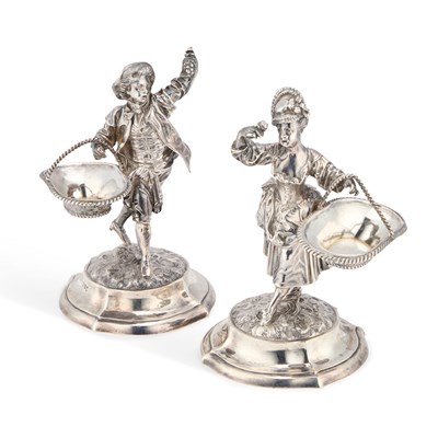 Lot A FINE PAIR OF VICTORIAN SILVER FIGURAL SALTS