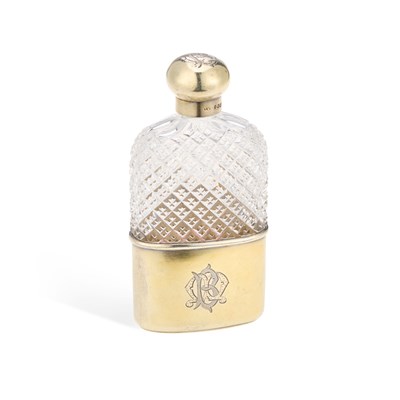 Lot 174 - A VICTORIAN SILVER-GILT AND CUT-GLASS SPIRIT FLASK