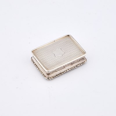 Lot 524 - AN EARLY VICTORIAN CASTLE-TOP SNUFF BOX