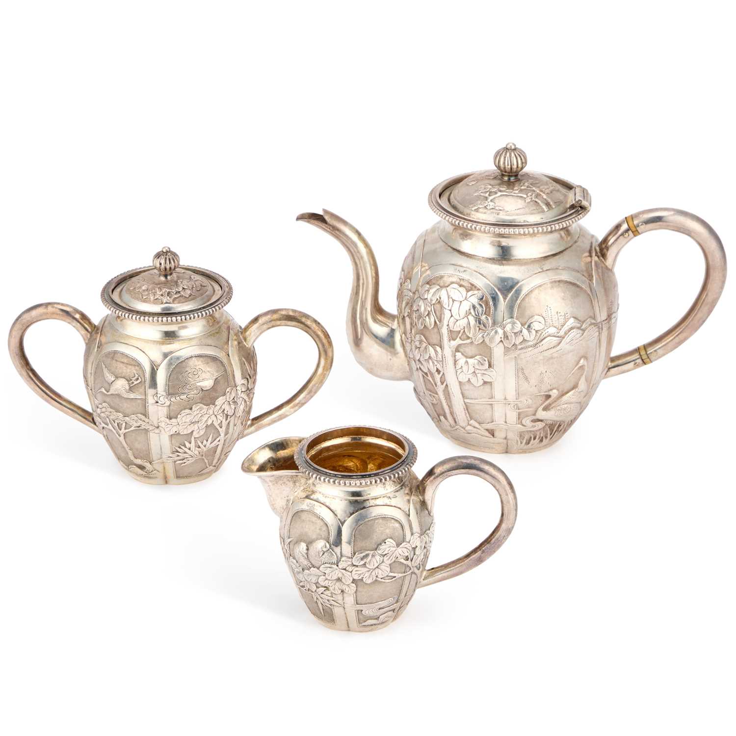 Lot A CHINESE SILVER THREE-PIECE TEA SERVICE