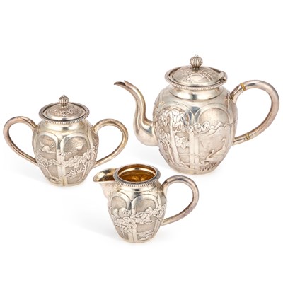 Lot A CHINESE SILVER THREE-PIECE TEA SERVICE