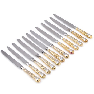 Lot A SET OF TWELVE ELIZABETH II SILVER AND SILVER-GILT TABLE KNIVES