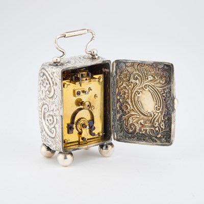 Lot 494 - A LATE VICTORIAN SILVER CARRIAGE CLOCK