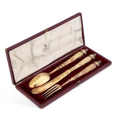 Lot A CASED SET OF VICTORIAN SILVER-GILT CUTLERY