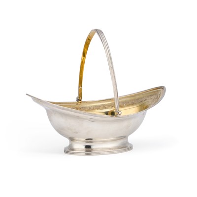Lot A GEORGE III SILVER AND SILVER-GILT SWING-HANDLE BASKET