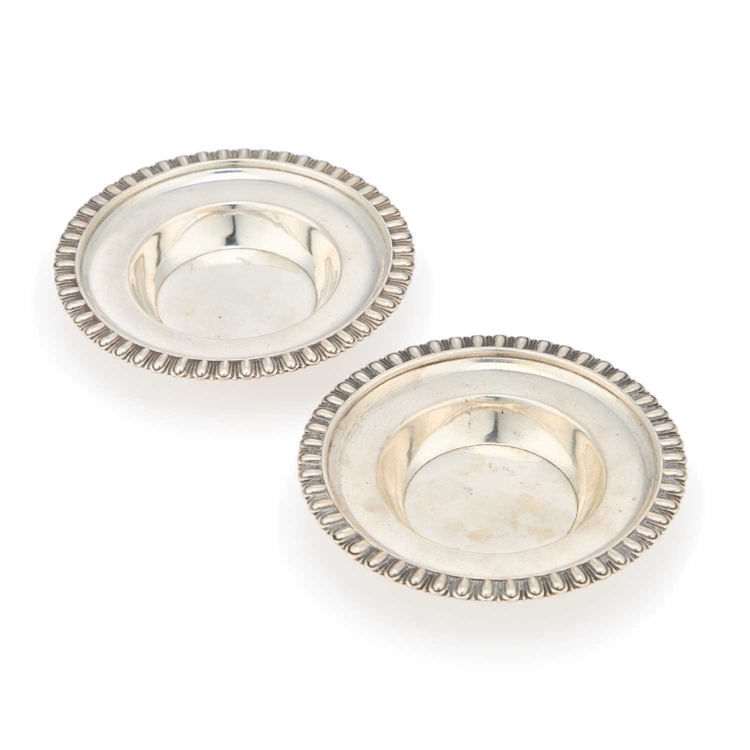 Lot A PAIR OF GEORGE III SILVER DISHES