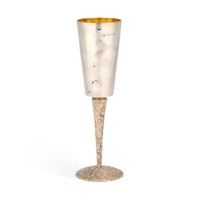 Lot STUART DEVLIN: AN ELIZABETH II PARCEL-GILT SILVER CHAMPAGNE FLUTE OR GOBLET