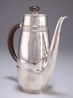 Lot 1385 - AN ARTS AND CRAFTS SILVER COFFEE POT