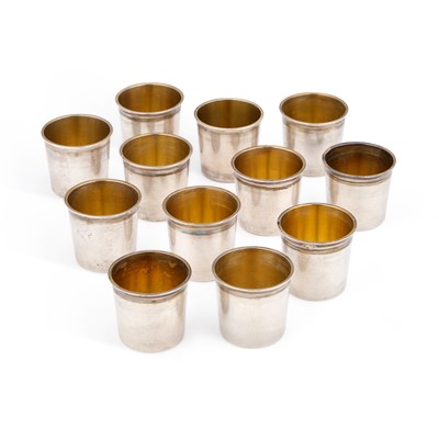 Lot A SET OF TWELVE FRENCH SILVER SMALL BEAKER CUPS