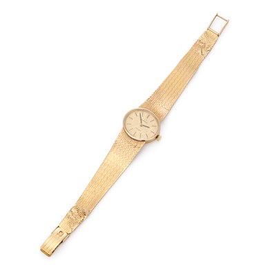 Lot 594 - A LADY'S 9CT GOLD OMEGA BRACELET WATCH