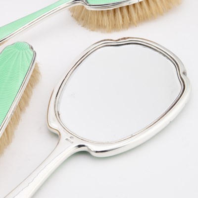 Lot 399 - AN ART DECO SILVER AND GREEN ENAMEL DRESSING TABLE SET
