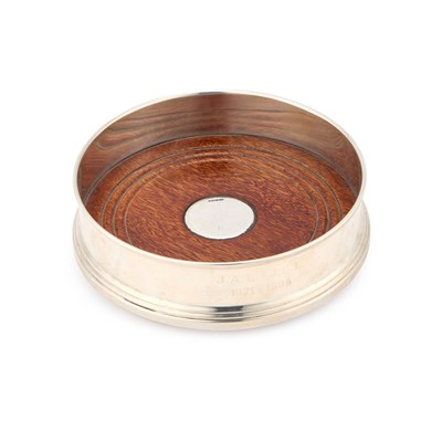 Lot AN ELIZABETH II SILVER WINE COASTER