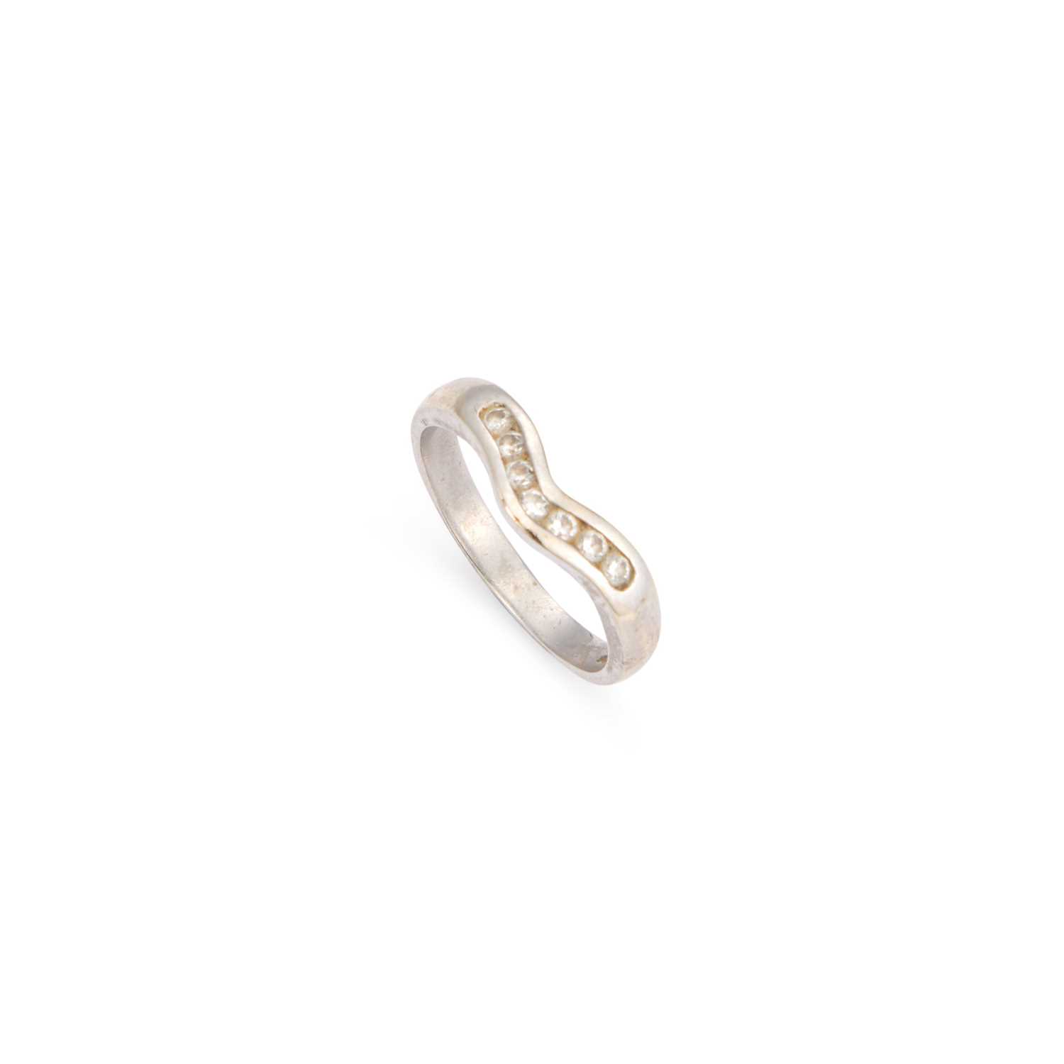 Lot 649 - A 9 CARAT WHITE GOLD DIAMOND WISHBONE RING