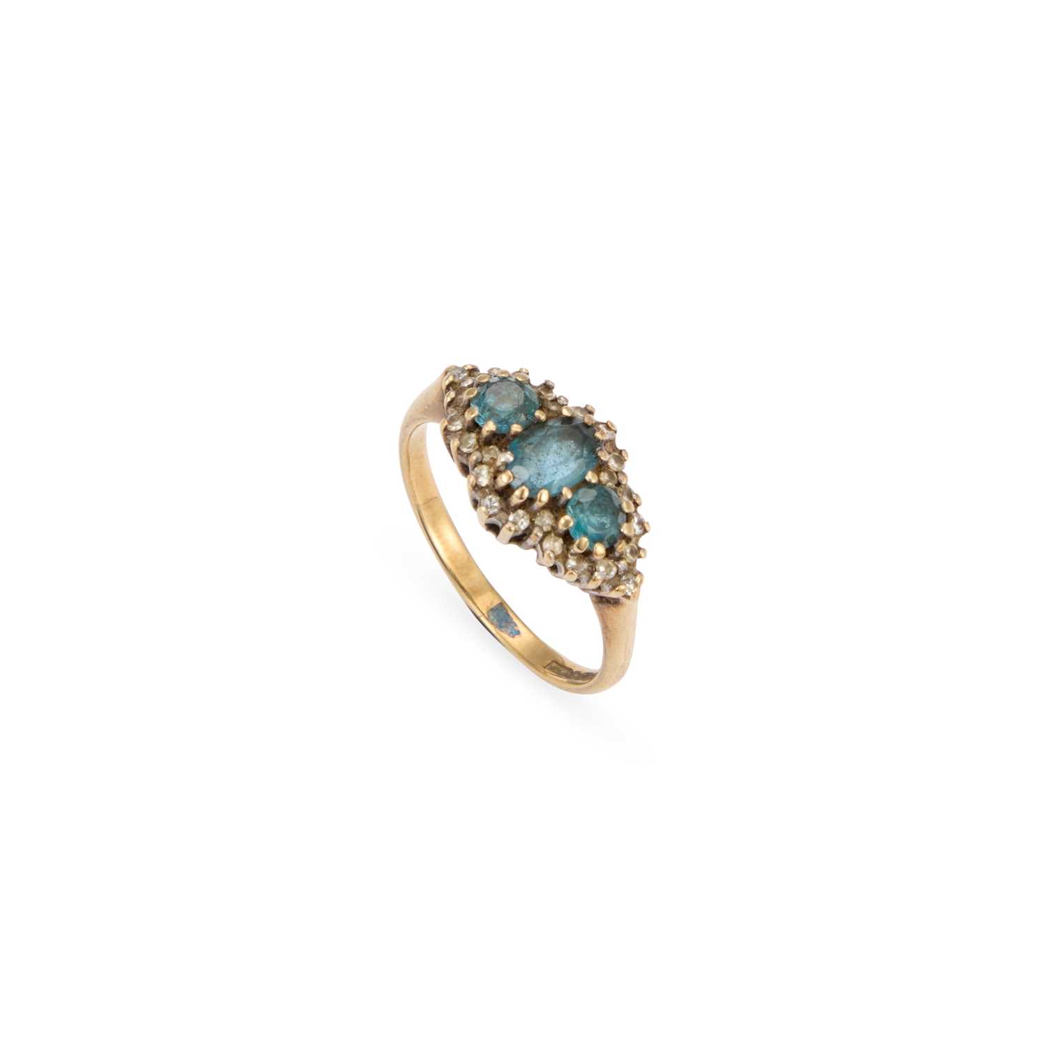 Lot 715 - A 9 CARAT GOLD BLUE TOPAZ AND DIAMOND CLUSTER RING