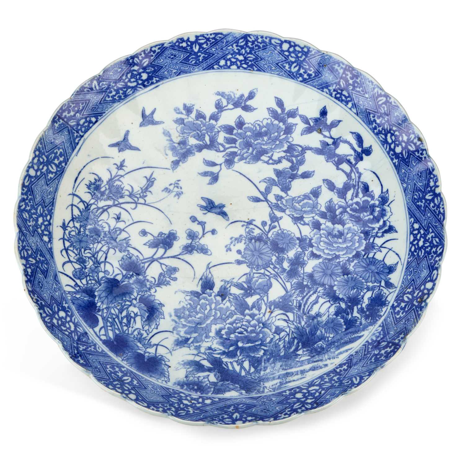 Lot 120 - A LARGE JAPANESE BLUE AND WHITE PORCELAIN CHARGER