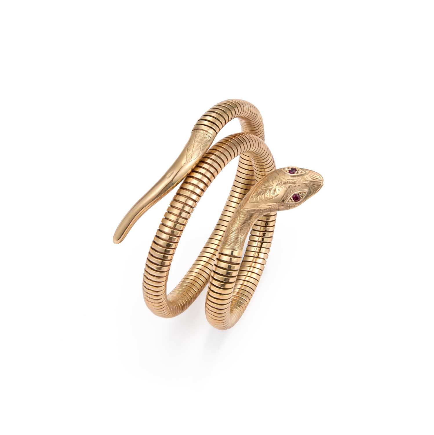 Lot 650 - A 9 CARAT GOLD COILED SNAKE BANGLE