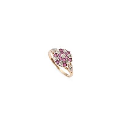 Lot 696 - A 9 CARAT GOLD RUBY AND DIAMOND CLUSTER RING