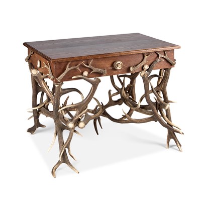 Lot 308 - AN OAK AND ANTLER WRITING TABLE