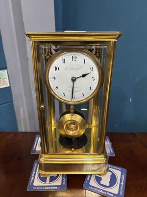 Lot 951 - A RARE EARLY 20TH CENTURY ELECTRIC FOUR-GLASS MANTEL CLOCK