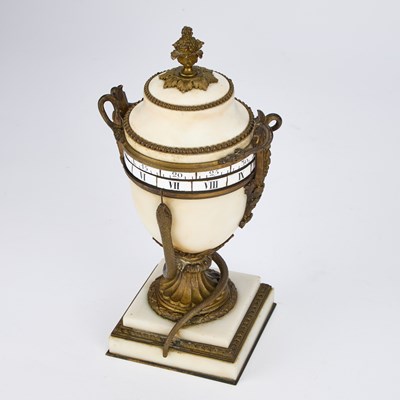 Lot 953 - A FRENCH WHITE MARBLE AND ORMOLU ANNULAR DIAL CLOCK