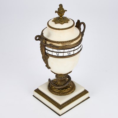 Lot 953 - A FRENCH WHITE MARBLE AND ORMOLU ANNULAR DIAL CLOCK