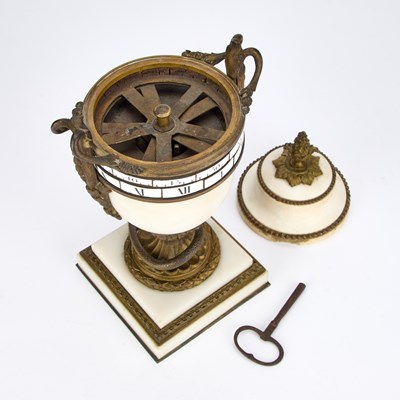 Lot 953 - A FRENCH WHITE MARBLE AND ORMOLU ANNULAR DIAL CLOCK
